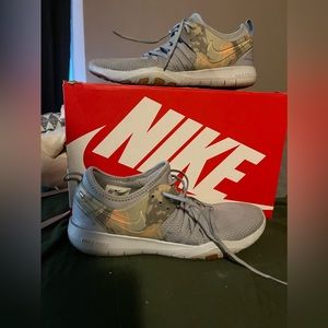 Grey nike running shoes